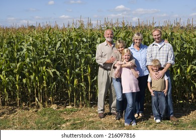 Family Of Three Generations By Corn Field, Smiling, Portrait