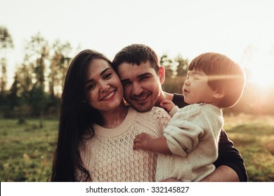 Family Of Three People