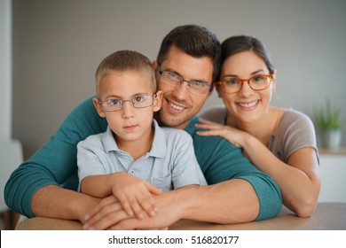 Family Of Three People Wearing Eyeglasses