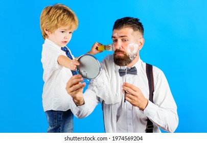 Family Time. Fathers Day. Son And Father Shaving Beard. Assistant For Dad. Little Barber. Barbershop.