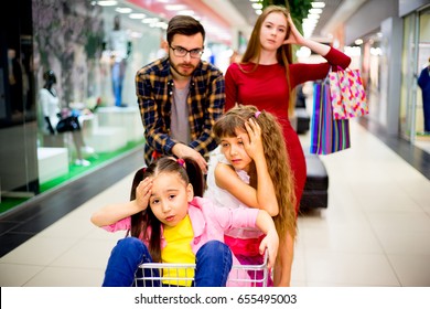 Family Tired With Shopping