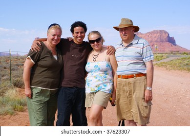 Family Of Tourists In Monument Valley Tribal Park