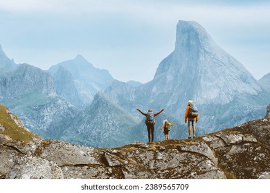 Family travel adventure in Norway mountains, parents and child on active outdoor vacation. Mother, father, and kid hiking together healthy lifestyle tour in Lofoten islands, freedom concept - Powered by Shutterstock