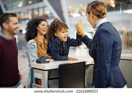 Family, travel and high five, child and parents with airport staff, happiness and vacation, ready for adventure. Happy people, diversity and freedom, support with holiday abroad, flight and airplane
