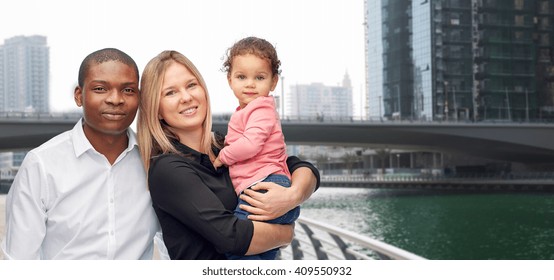 Family, Travel, Tourism And International Concept - Happy Multiracial Mother, Father And Little Child Over Dubai City Street Background