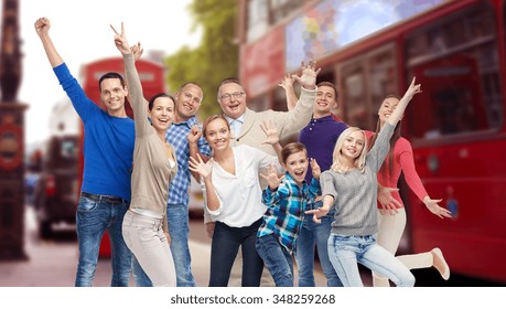 Family, Travel, Tourism And People Concept - Group Of Happy Men, Women And Boy Having Fun And Waving Hands Over London City Street Background