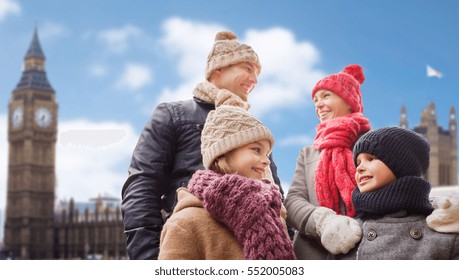 Family, Travel, Tourism, Winter Holidays And People Concept - Happy Parents With Kids Over London City Background
