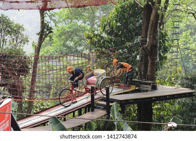 Family Travelers Enjoy An Exciting Journey On One Of The Most Popular Tourist Attraction At Pongyang Jungle Coaster And Zipline,maerim In Chiang Mai 15 March 2019