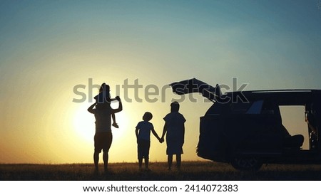 Similar – Image, Stock Photo silhouette of woman driving in a car  through mountains closeup. Road trip and adventure.