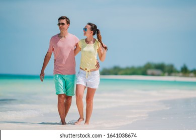 Family of two on beach vacation enjoying summer vacation - Powered by Shutterstock