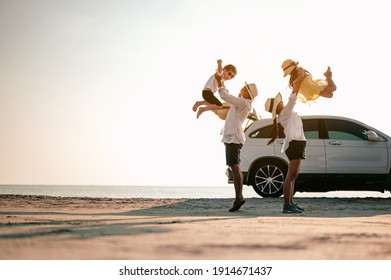Family vacation holiday,Happy family, parents holding children flying in the sky.Concept family and Holiday and travel.