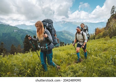 Family Vacation Parents Hiking With Child Travel Adventure Active Healthy Lifestyle Man And Woman Hikers With Backpack Sustainable Tourism Outdoor