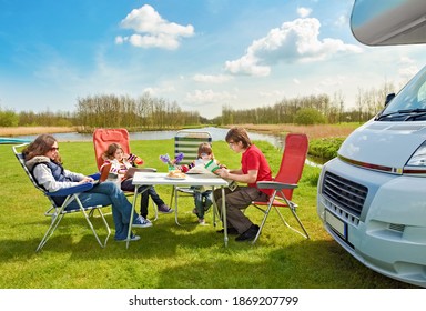 Family Vacation, RV Travel With Kids, Happy Parents With Children Have Fun On Holiday Trip In Motorhome, Camper Exterior
