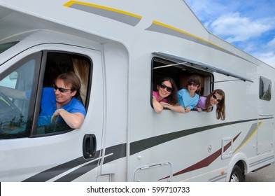 Family Vacation, RV Travel With Kids, Happy Parents With Children On Holiday Trip In Motorhome, Camper Exterior
