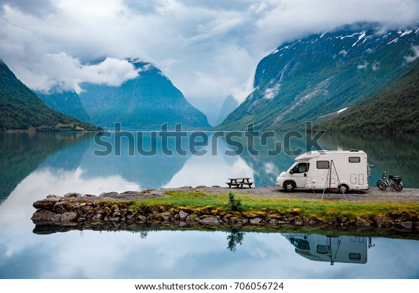 Family\
vacation travel, holiday trip in motorhome, Caravan car Vacation.\
Beautiful Nature Italy natural landscape\
Alps.