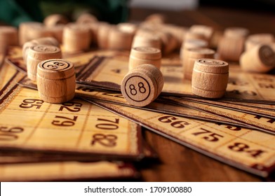 Family Vintage Interesting Lotto Bingo Game, Bingo Cards And Bingo Balls Lie On A Wooden Table