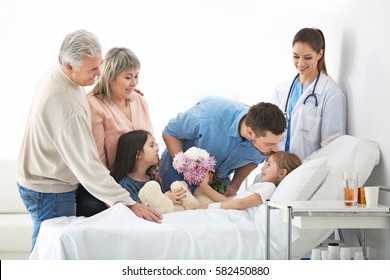 Family Visiting Little Girl In Hospital