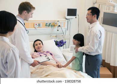 Family visiting mother in the hospital