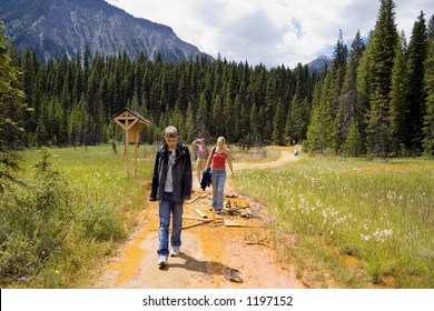 Family Visiting The Paint Pots - Located In The Kootenay National Park, BC, Canada