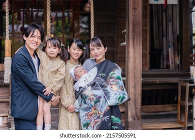 Family visiting the shrine with their baby