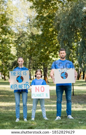 Similar – Women showing poster with metoo hashtag