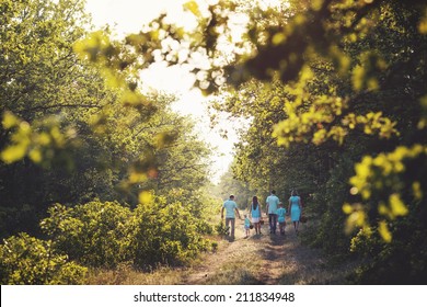 Family walking in the forest 