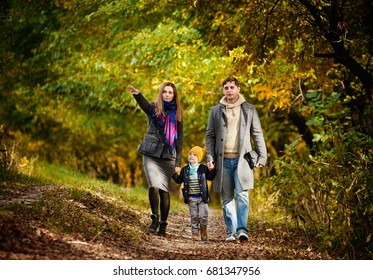Family walking in forest