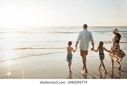 Family, walking and holding hands with children on beach for summer holiday, weekend or bonding together in nature. Back view of mother, father and kids strolling on ocean coast for sunset vacation - Powered by Shutterstock