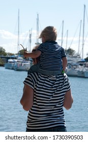 Family Walking At Marina Cove Marina Gold Coast Australia