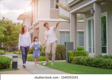 family walking on the model new house looking for living life future, new family meet new house