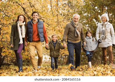 Family walking together in park - Powered by Shutterstock