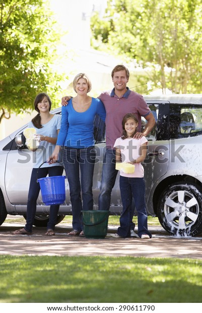 Family Washing Car\
Together