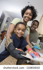 Family Washing Dishes