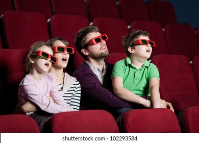 Family Watching A 3D Movie