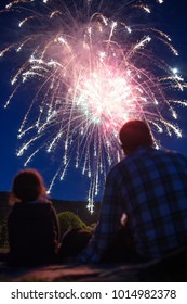 Family Watching 4th Of July Fireworks Together