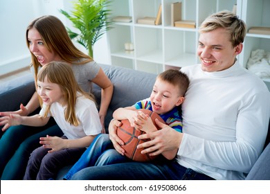 Family Watching Basketball