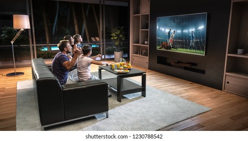 A family is watching a soccer moment on the TV and celebrating a goal, sitting on the couch in the living room. The living room is made in 3D. - Shutterstock ID 1230788542