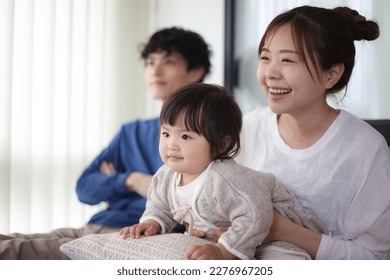 Family watching sports on TV
 - Powered by Shutterstock