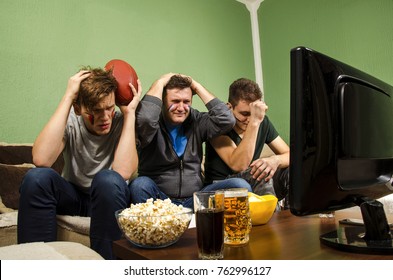 Family Watching Super Bowl, Near Miss, Missed Chance, Father And Sons Holding Head In Despair 