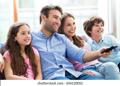 Family watching TV 