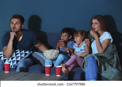 Family Watching Tv On Sofa Evening Stock Photo 1167797980 | Shutterstock