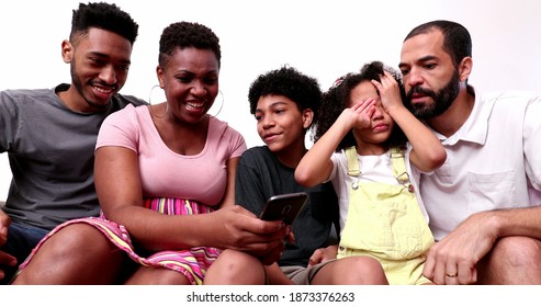 Family Waving Hello To Camera Speaking Video Conference POV