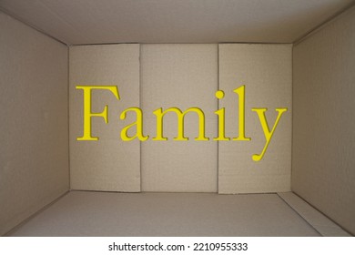 Family Word With Cardboard Box. Brown Folded Card Box.