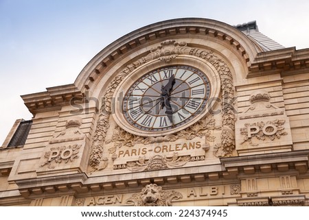 Famous ancient clock on the wall of Orsay Museum in Paris
