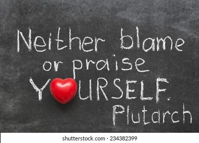 Famous Ancient Greek Philosopher Plutarch Quote About Praise Or Blame Yourself Handwritten On Blackboard