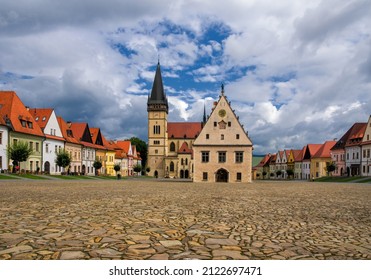 Famous baths Bardejov in Slovakia with old historical town square with preserved bourgeois houses with colorful facades listed in UNESCO world heritage - Shutterstock ID 2122697471