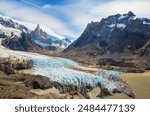 Famous beautiful peak Cerro Torre in Patagonia mountains, Argentina. Beautiful mountains landscapes in South America. Autumn season.