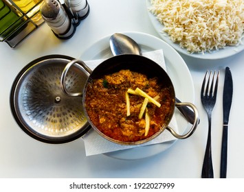 Famous Bengali Mutton Curry Kosha Mangsho From Goat Meat Cooked With Potatoes In Rich Ginger Garlic Gravy With Tomatoes And Curd ..