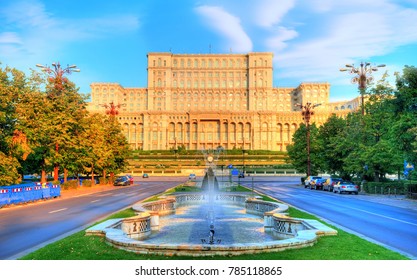 Famous and biggest building of the world, Palace of Parliament illuminated by sunrise light in the most beautiful place of Bucharest, capital of Romania in Eastern Europe