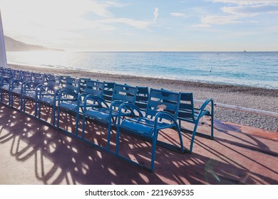 Famous blue chairs on the Promenade des Anglais in Nice - Shutterstock ID 2219639535